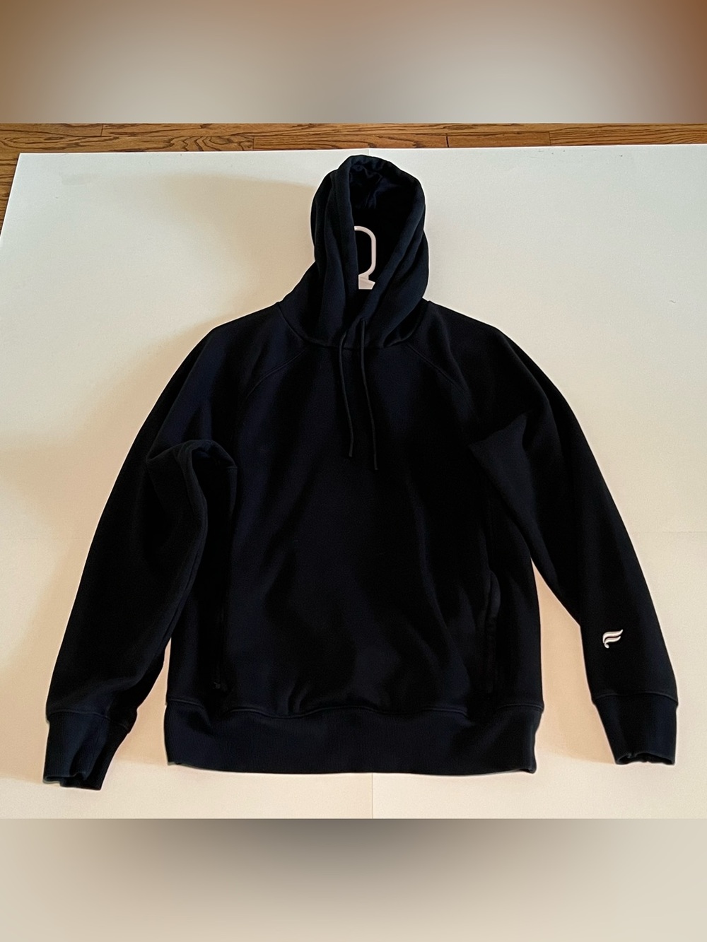 Fabletics Men's Black Pullover Hoodie with Subtle Logo